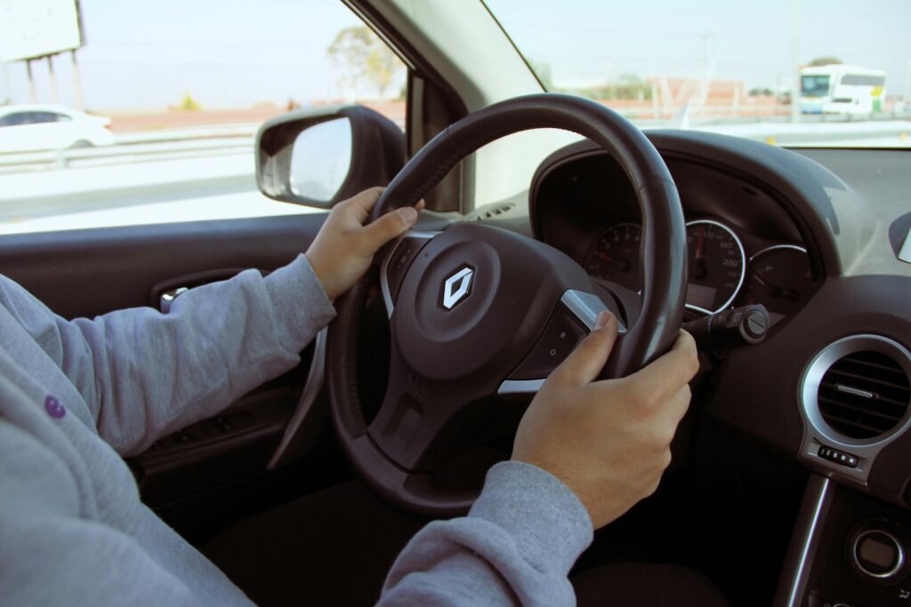 Driver Holding Steering Wheel